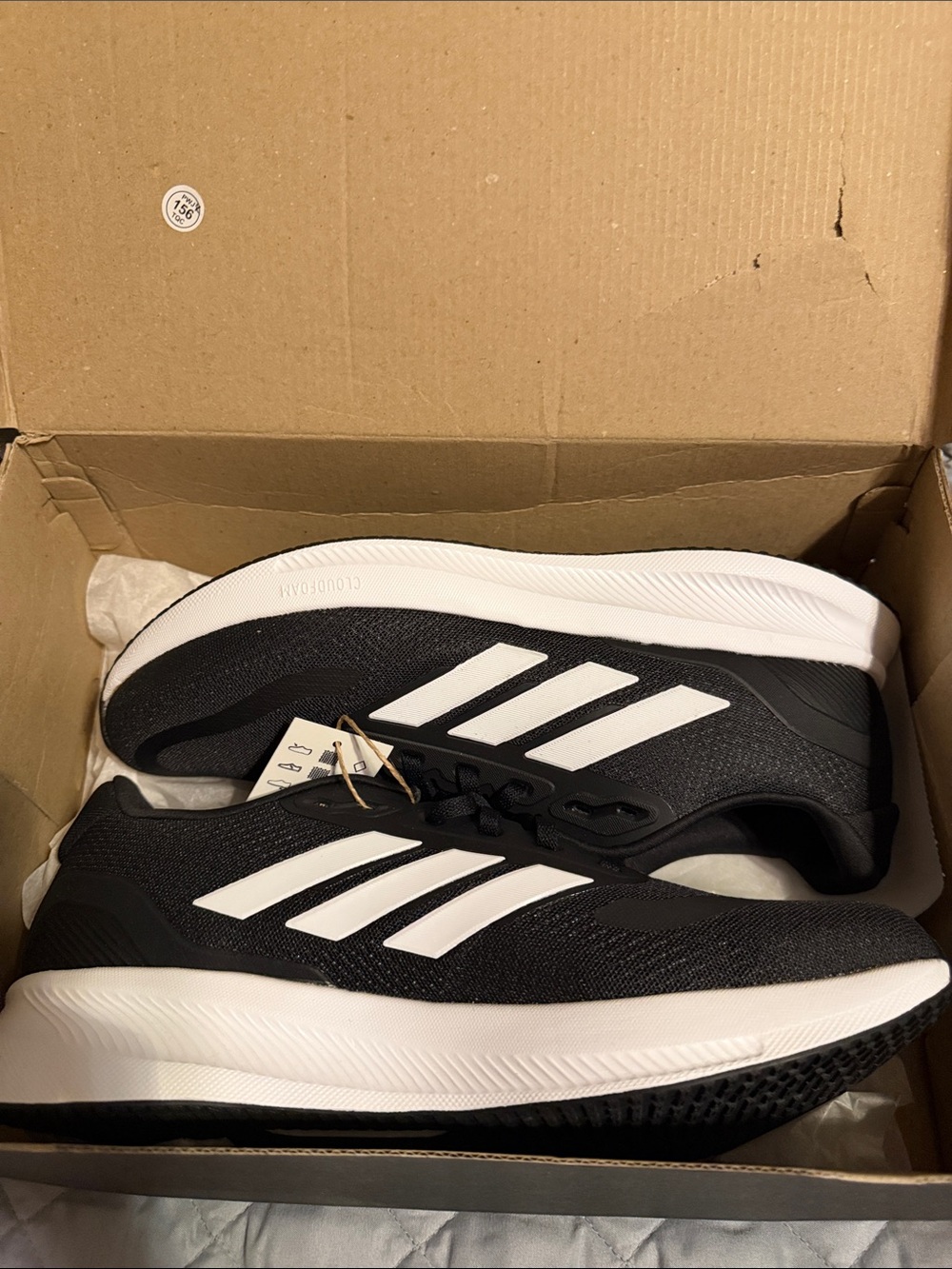 adidas Men’s Black and White Daily Running Sneakers